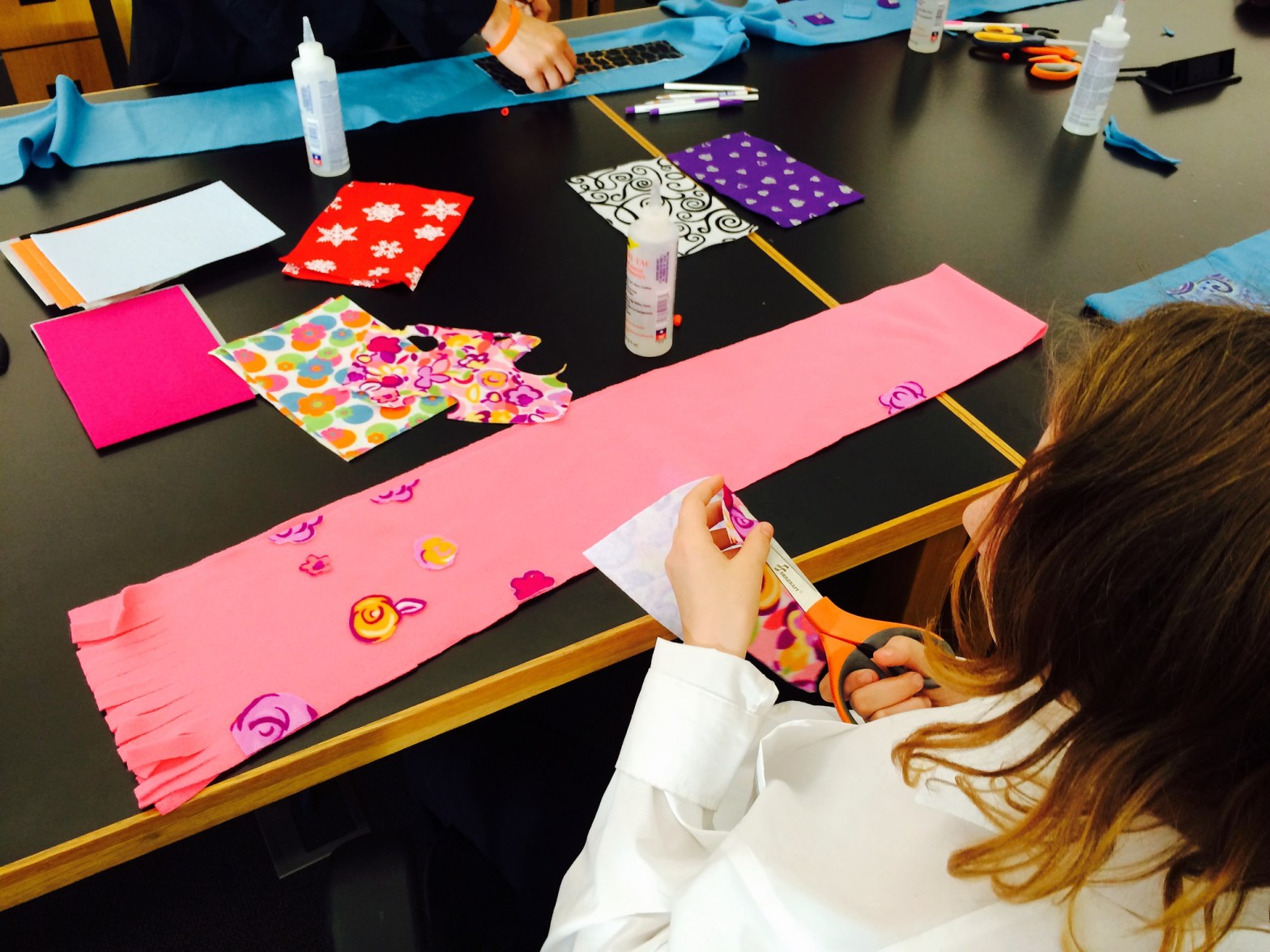 No Sew Fleece scarves being made at the Allen County Public Library in Indiana.